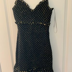 Shimmery, black and gold polka dot dress